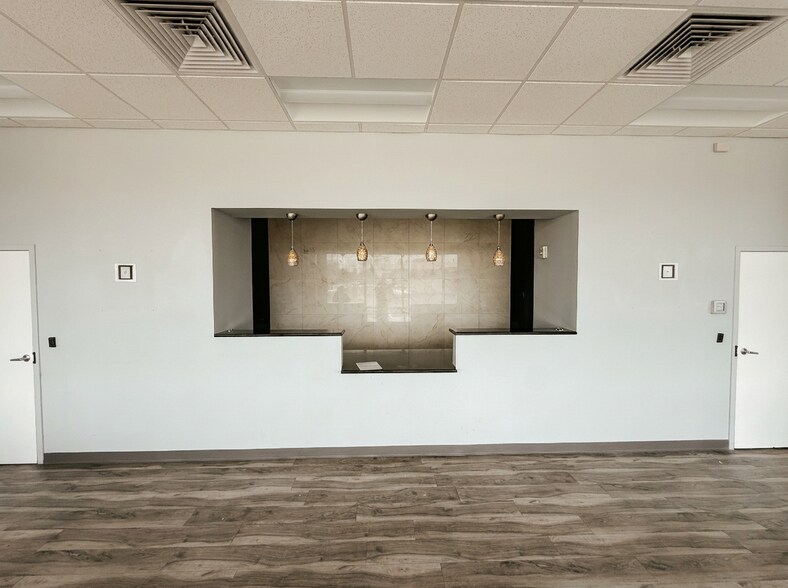 Primary Photo Of 7701 W Hillsborough Ave, Tampa Storefront For Lease