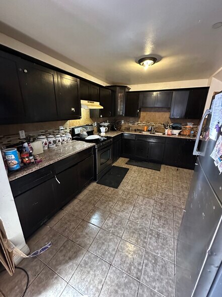 More Photos Of 9123 Orchard Ave, Los Angeles Multifamily For Sale