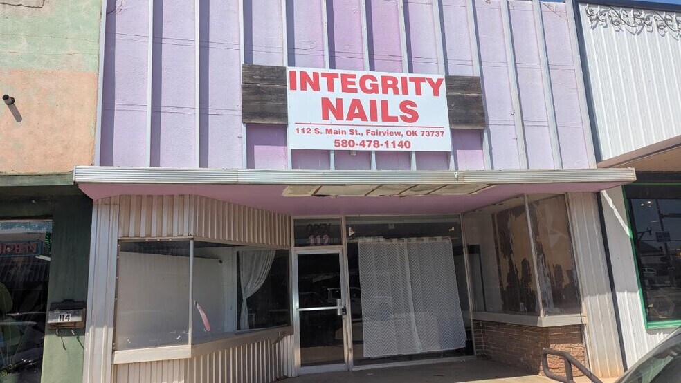 Primary Photo Of 112 S Main St, Fairview Storefront For Sale