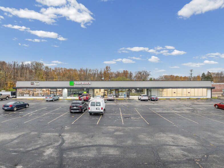 Primary Photo Of 6704-6720 N Ridge Rd, Madison General Retail For Sale