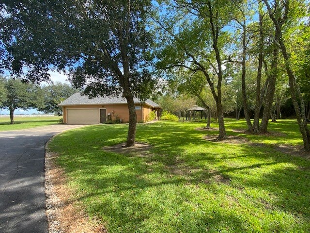 More Photos Of 19019 FM 2100, Crosby Land For Sale