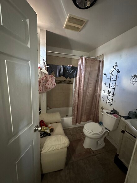 More Photos Of 9123 Orchard Ave, Los Angeles Multifamily For Sale