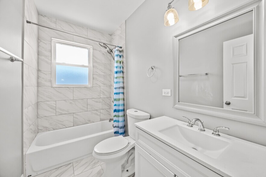 More Photos Of 2209 N Mango Ave, Chicago Apartments For Sale