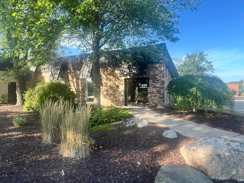 Primary Photo Of 5716 W River Rd NE, Belmont Manufacturing For Lease