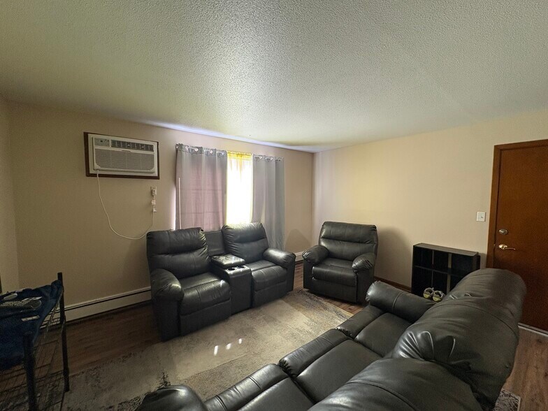 More Photos Of 113 2nd St NE, Mitchellville Apartments For Sale