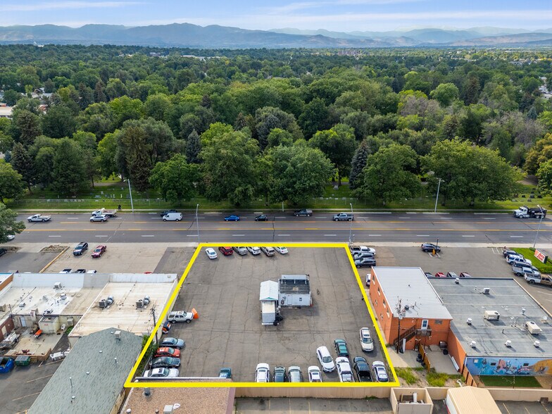 Primary Photo Of 1128 Main St, Longmont General Retail For Sale