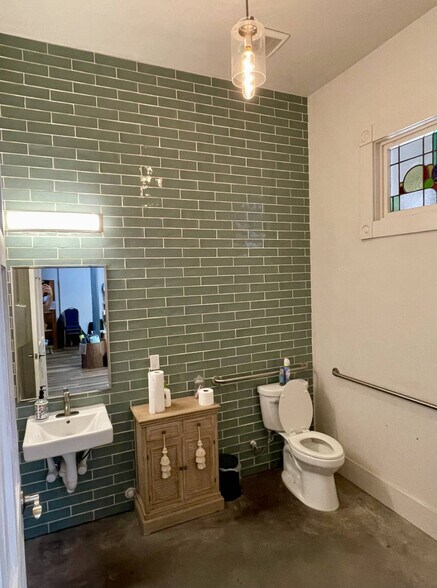 More Photos Of Block of South Baylor Commerce and S. St. Charles St, Brenham Storefront Retail Office For Sale