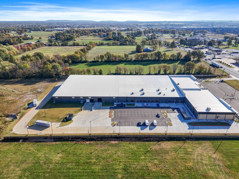 More Photos Of 516 W Henri de Tonti Blvd, Tontitown Industrial For Lease