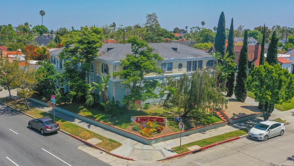 Primary Photo Of 1000-1002 S Ridgeley Dr, Los Angeles Apartments For Sale