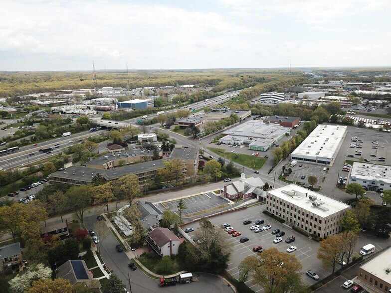 More Photos Of 100 Sunnyside Blvd, Plainview Bank For Sale