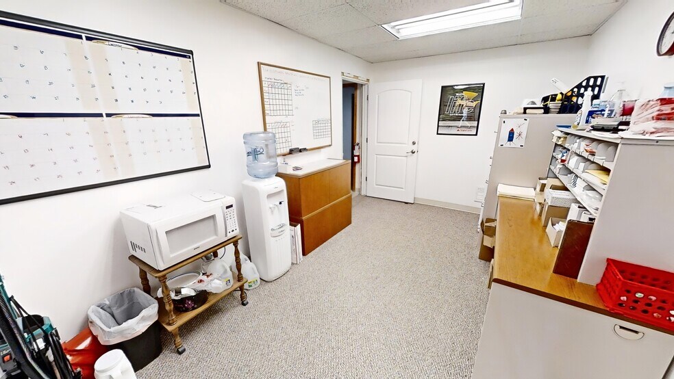 More Photos Of 103-105 E 27th St, Hays Office For Sale