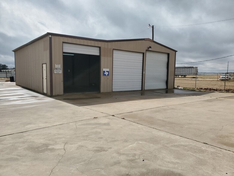 Primary Photo Of 108 West Gillum, Grandview Warehouse For Sale