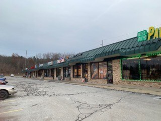 More Photos Of 2928-2950 E Highland Rd, Highland Township General Retail For Lease