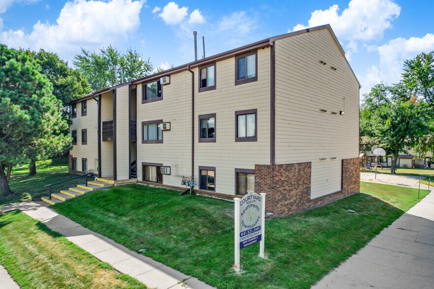 Primary Photo Of 1453 N 11th Ave E, Newton Apartments For Sale