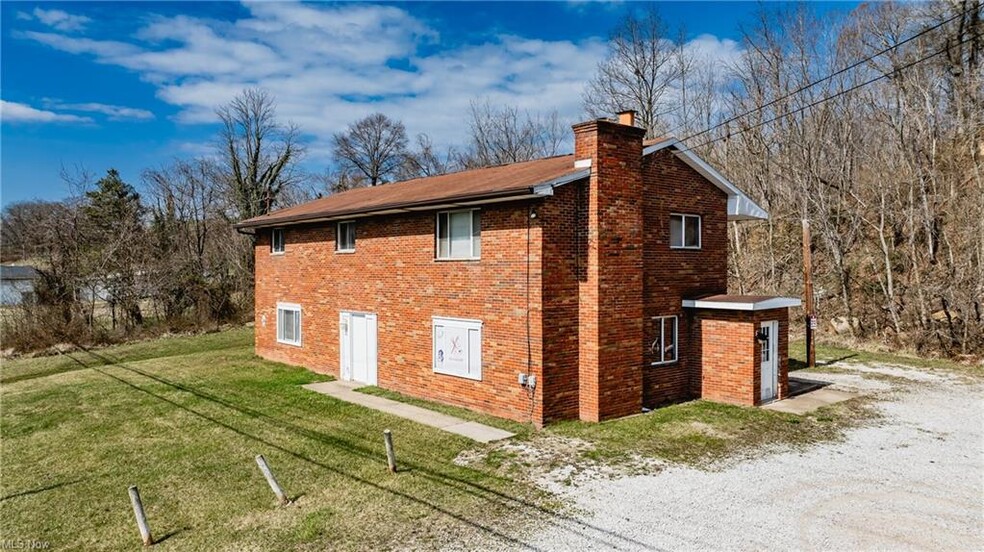 Primary Photo Of 2242 DuPont Rd, Parkersburg Office Residential For Sale