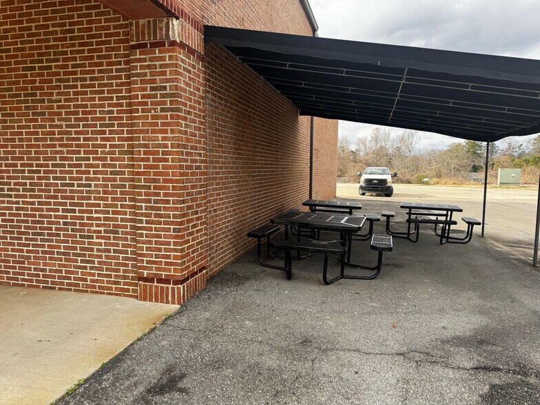 More Photos Of 200 W Clinton St, Gray Storefront For Lease