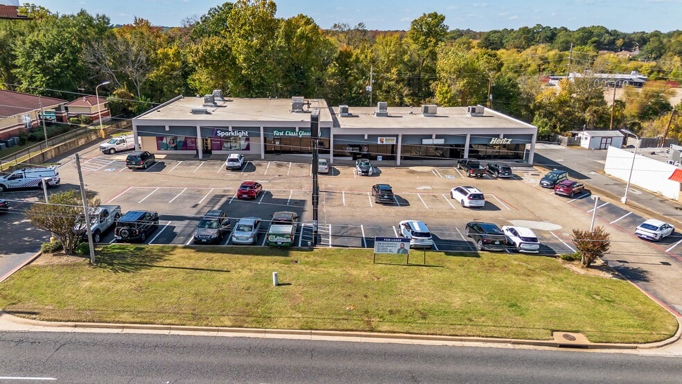 Primary Photo Of 313-323 N Spur 63, Longview Storefront Retail Office For Sale