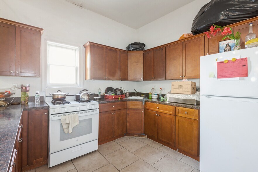 More Photos Of 100-10-100-12 103rd Ave, Ozone Park Multifamily For Sale