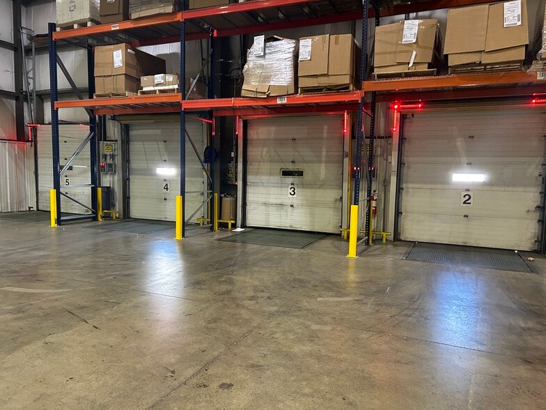 More Photos Of 202-206 Regas Rd, Madison Warehouse For Lease