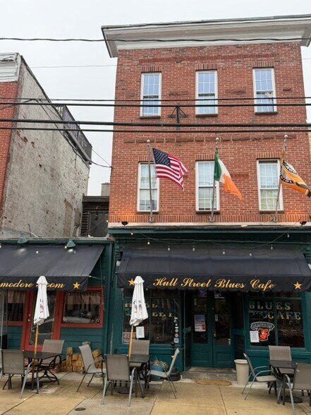 Primary Photo Of 1222 Hull St, Baltimore Storefront Retail Residential For Sale