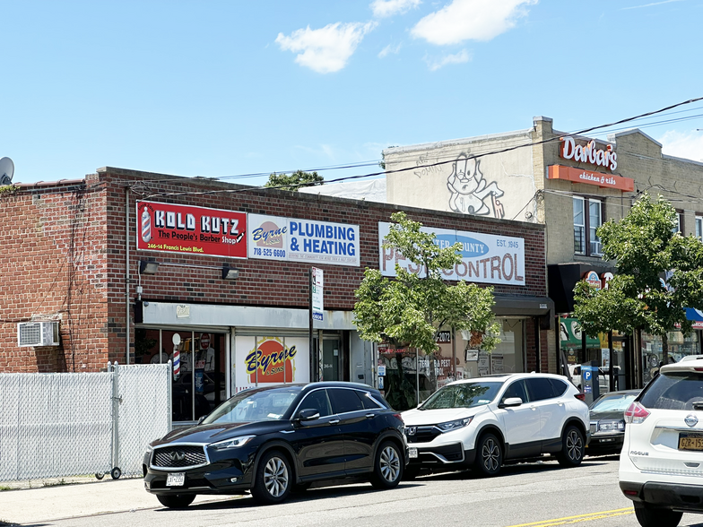 Primary Photo Of 24610 Francis Lewis Blvd, Rosedale Freestanding For Sale