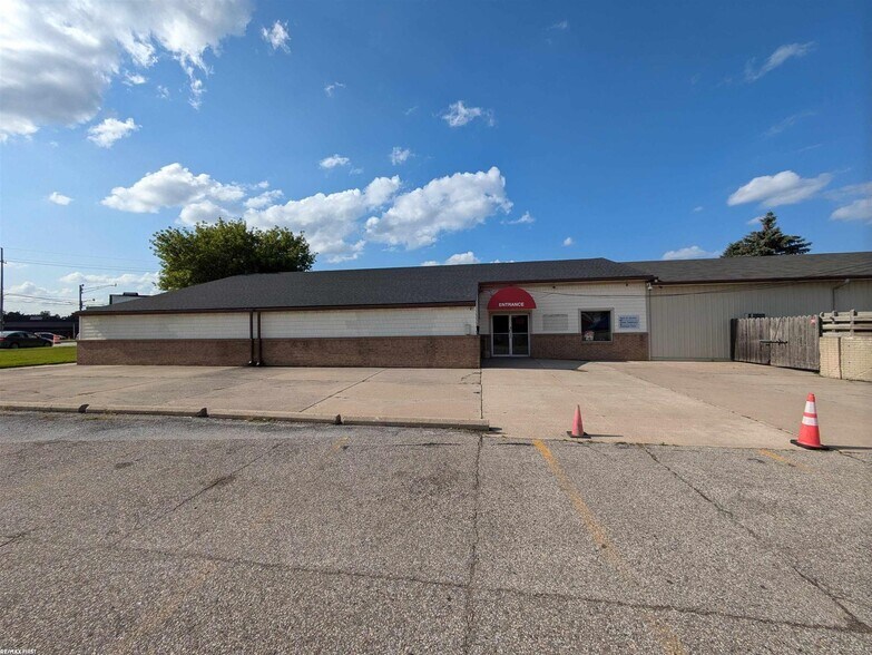 Primary Photo Of 35850 Utica Rd, Clinton Township General Retail For Sale