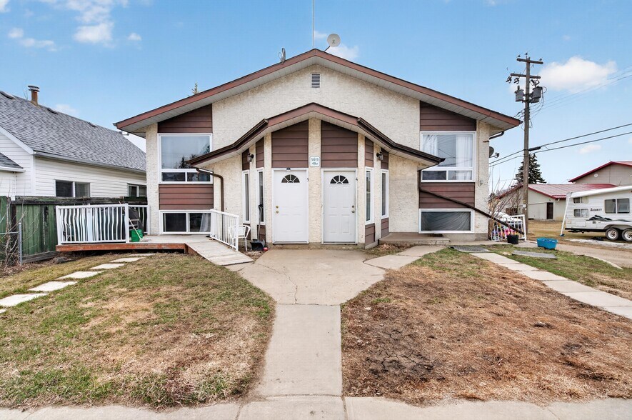 More Photos Of 5015 48 St, Legal Apartments For Sale