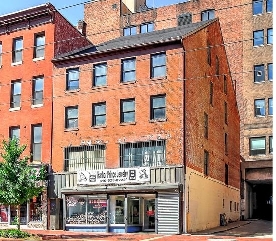 Primary Photo Of 114 N Howard St, Baltimore Storefront Retail Residential For Sale