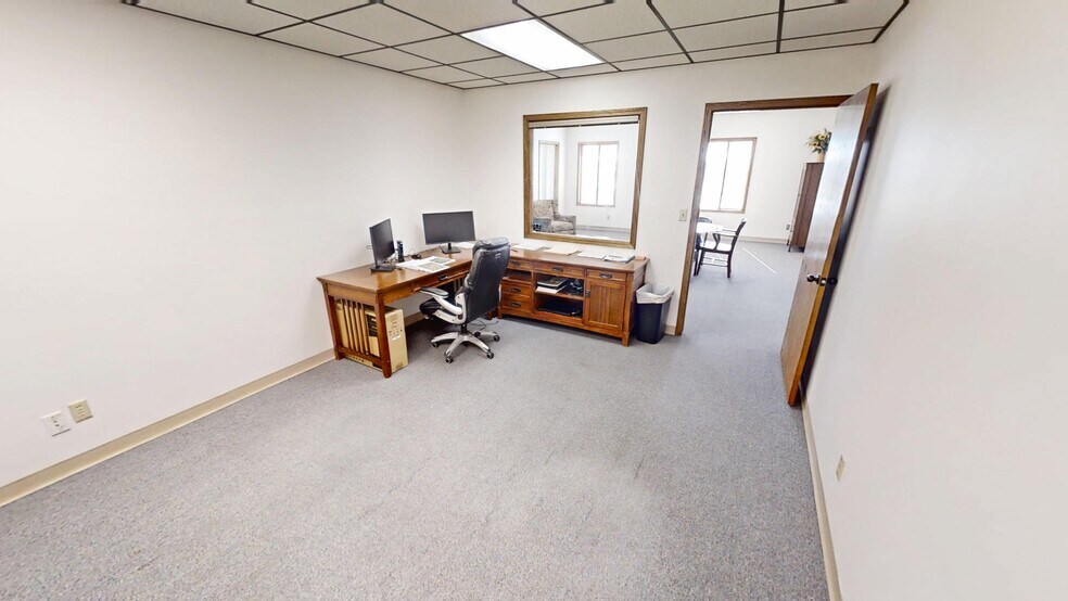 More Photos Of 103-105 E 27th St, Hays Office For Sale
