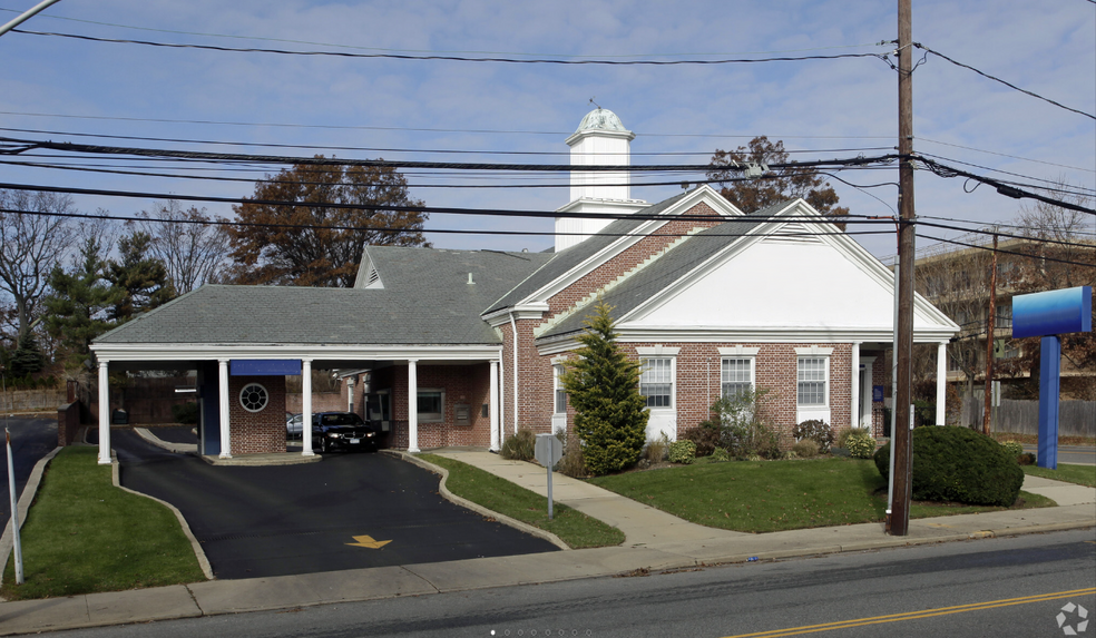 Primary Photo Of 100 Sunnyside Blvd, Plainview General Retail For Lease