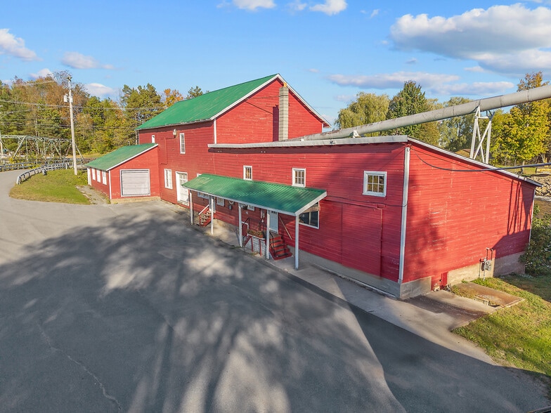 Primary Photo Of 9762 S Bridge St, Croghan Lumberyard For Sale