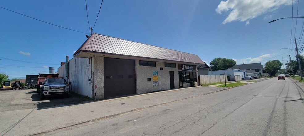 Primary Photo Of 1212-1218 Erie St, Utica Auto Repair For Sale