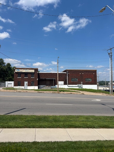 Primary Photo Of 6924 E Truman Rd, Kansas City Warehouse For Sale