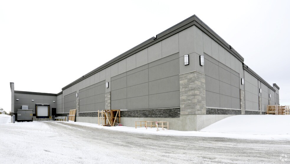 More Photos Of 100 Rainbow Rd, Chestermere Freestanding For Lease