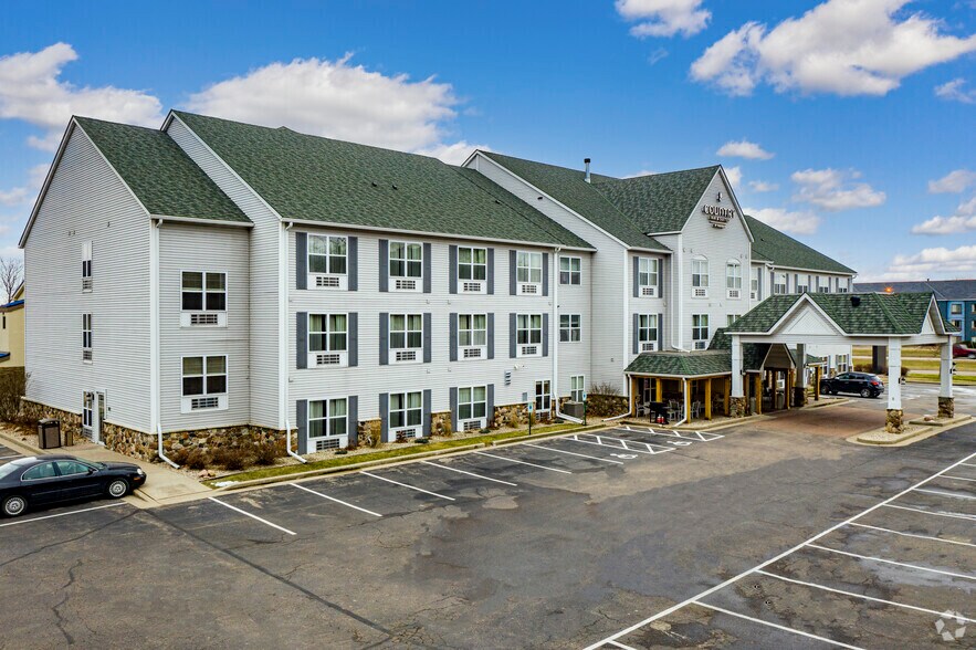 Primary Photo Of 301 Division St N, Stevens Point Hotel For Sale