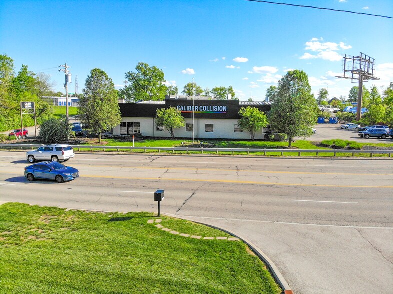 Primary Photo Of 6947 E Kemper Rd, Cincinnati Auto Repair For Sale