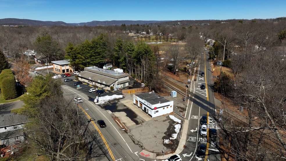 Primary Photo Of 116 N Central Ave, Ramsey Service Station For Sale