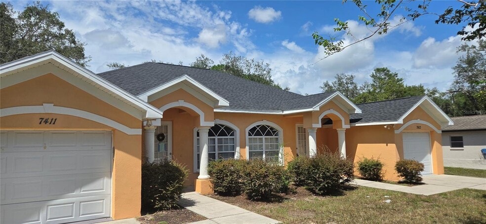 Primary Photo Of 7411 Canterbury St, Spring Hill Apartments For Sale