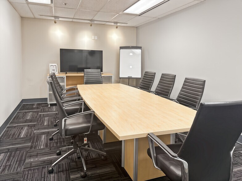 More Photos Of 5811 Cooney Rd, Richmond Coworking Space