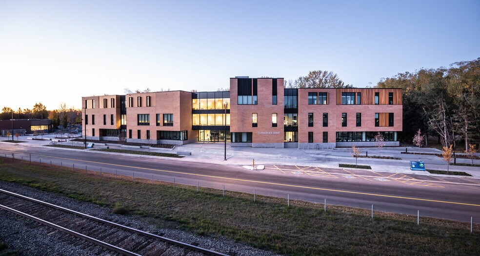 Primary Photo Of 23 Riverside Dr, Okotoks Schools For Lease