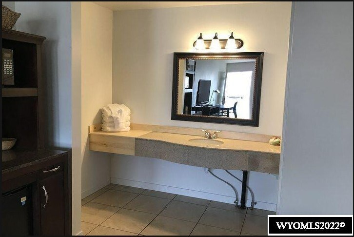 More Photos Of 1004 Dewar Dr, Rock Springs Hotel For Sale