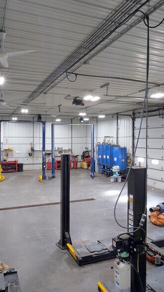 Primary Photo Of 203 Main St E, Elysian Auto Repair For Sale