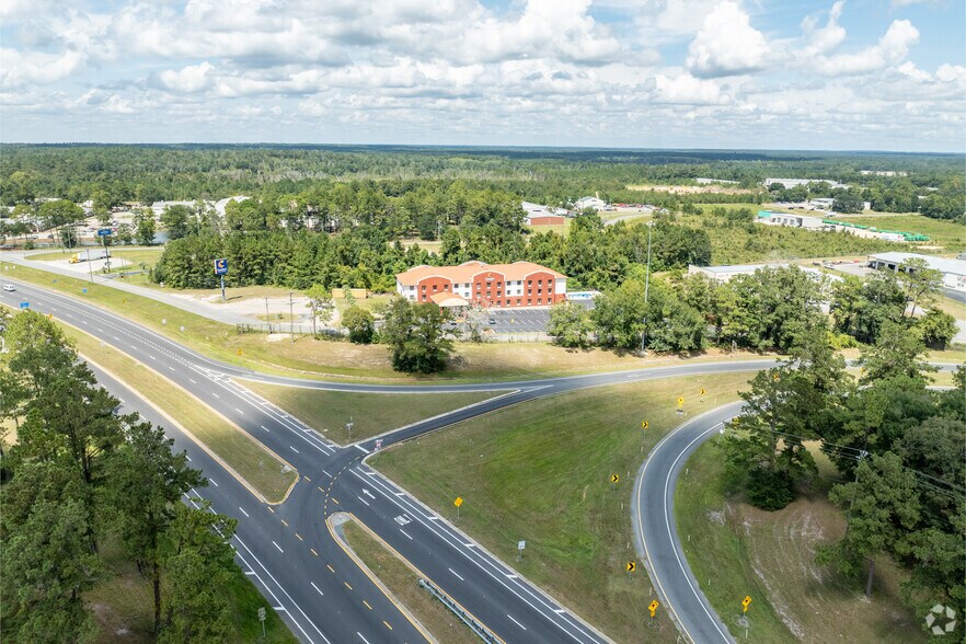 More Photos Of 215 Commerce Blvd, Midway Hotel For Sale