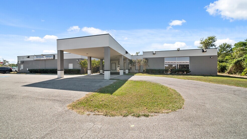 Primary Photo Of 910 N Highway 146, Baytown Medical For Sale
