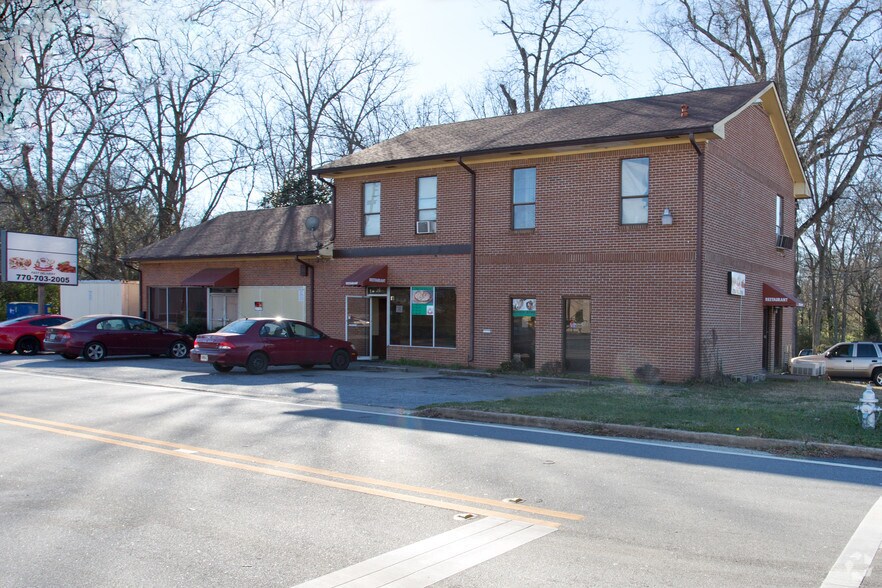 Primary Photo Of 27-29 Lee St, Jonesboro Storefront For Sale