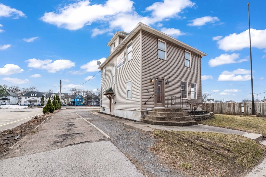 Primary Photo Of 135 W Ridge Rd, Rochester Storefront Retail Office For Sale