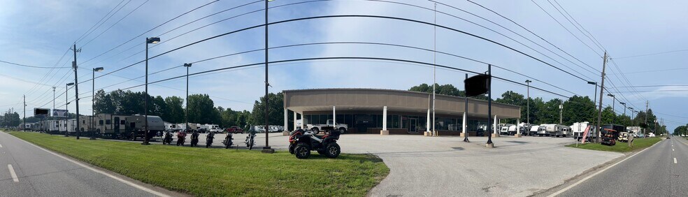 Primary Photo Of 7370 N Ridge Rd, Madison General Retail For Lease