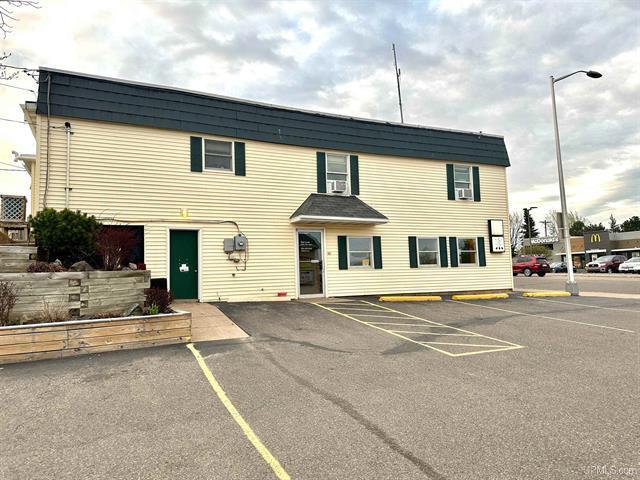 Primary Photo Of 1104 W Washington St, Marquette Office Residential For Sale