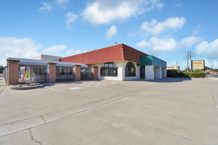 Primary Photo Of 10480 Live Oak Blvd, Live Oak Storefront For Sale