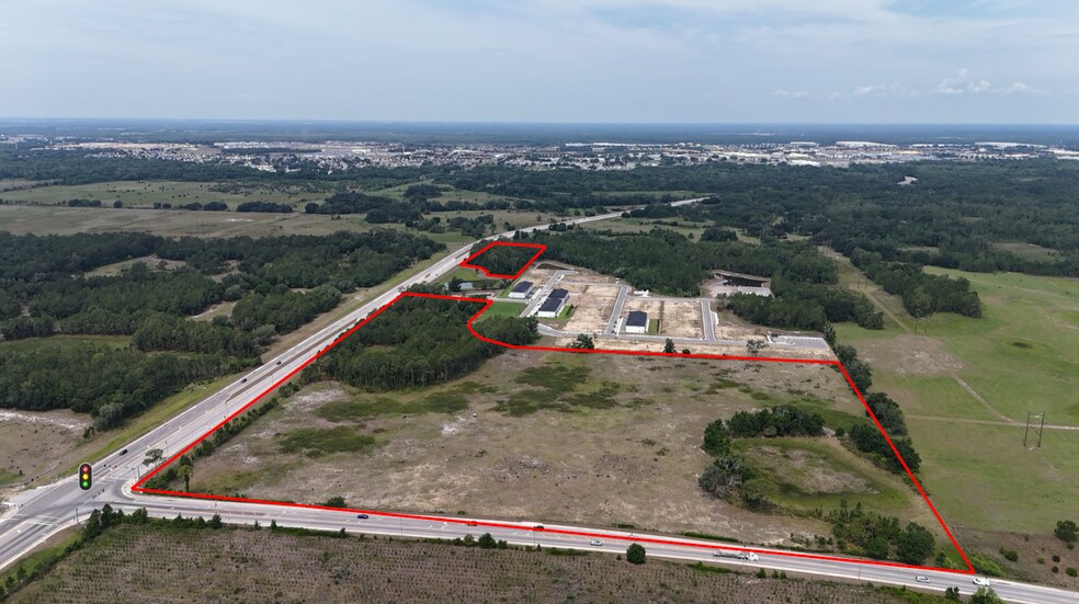 Primary Photo Of Pine Tree Trail @ Ernie Caldwell Blvd, Davenport Land For Sale